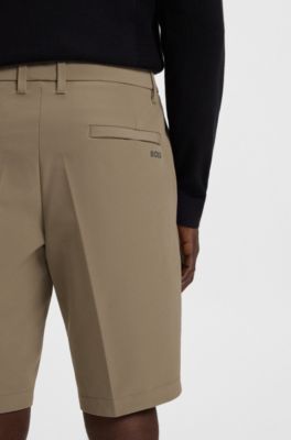 Bermuda slim fit in tessuto elasticizzato idrorepellente, Calce