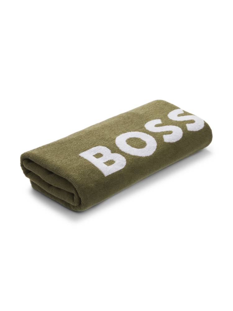 Artikel klicken und genauer betrachten! - Mit dem BOSS Badetuch bringst du frischen Wind in deine Sommer-Accessoires. Ein kontrastfarbenes Logo und Signature-Streifen verleihen dem Style einen zeitgemäßen Look. Aus besonders softem Baumwoll-Jacquard gefertigt.Die Maße: 90,0 x 180,0 Zentimeter.  Dieses Produkt wird mit Bio-Baumwolle gefertigt. Unsere Bio-Standards erlauben keine Verwendung von synthetischen Düngemitteln, Pestiziden oder gentechnisch verändertem Saatgut.  | im Online Shop kaufen