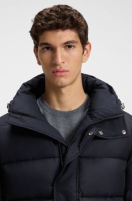 Chaqueta acolchada repelente al agua con capucha y silueta larga, Azul oscuro