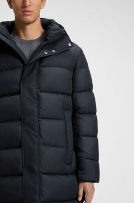 Chaqueta acolchada repelente al agua con capucha y silueta larga, Azul oscuro