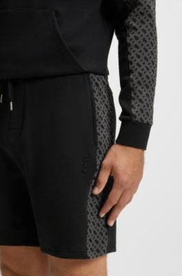 Cotton-blend shorts with monogram-pattern panels, Black