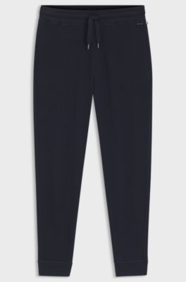Cotton-blend tracksuit bottoms with waffle structure, Dark Blue