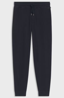 Cotton-blend tracksuit bottoms with waffle structure, Dark Blue