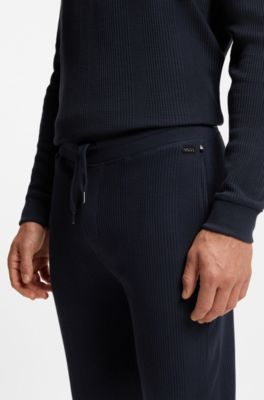 Cotton-blend tracksuit bottoms with waffle structure, Dark Blue