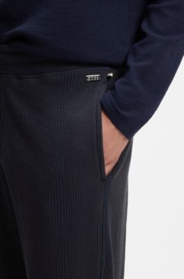 Cotton-blend tracksuit bottoms with waffle structure, Dark Blue