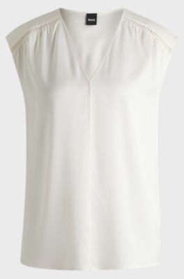 Sleeveless blouse in stretch-silk satin, White