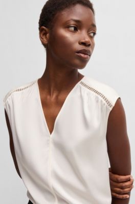 Sleeveless blouse in stretch-silk satin, White