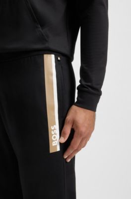 Cotton-terry tracksuit bottoms with stripe print, Black