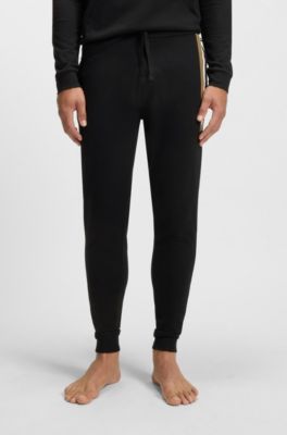 Cotton-terry tracksuit bottoms with stripe print, Black