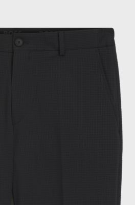 Tapered-fit trousers in stretch seersucker, Black