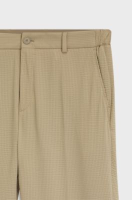 Tapered-fit trousers in stretch seersucker, Light Beige
