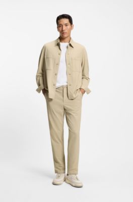 Tapered-fit trousers in stretch seersucker, Light Beige