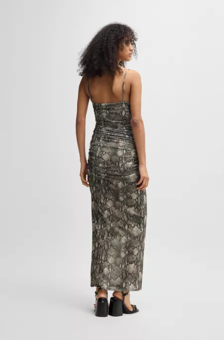 Corset-bodice dress with gathered mesh overlay