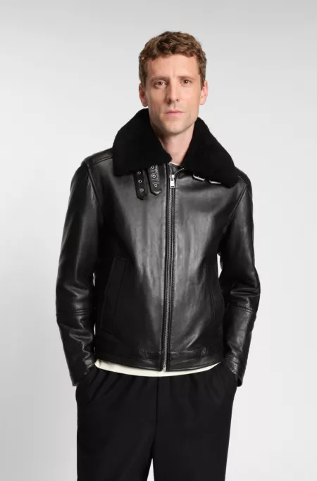 Leather jacket with shearling collar