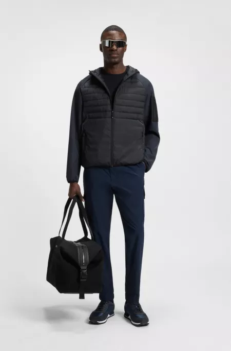 Water-repellent jacket with zipped sleeve pocket