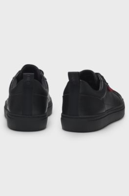Faux-leather trainers with red logo flag, Black