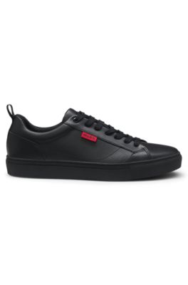 Faux-leather trainers with red logo flag, Black
