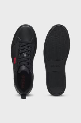 Faux-leather trainers with red logo flag, Black