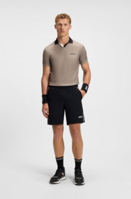 Actieve tennisshort van stretchstof met vochtregulatie, Zwart