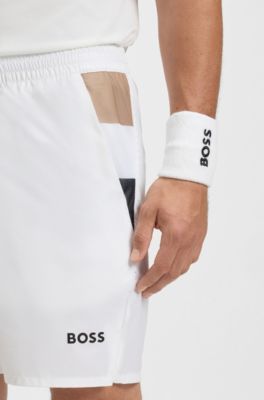 Shorts deportivos de tenis en tejido el&aacute;stico con control de la humedad, Blanco