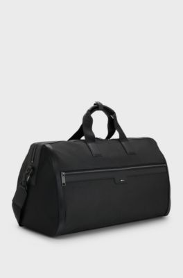 Zipped holdall in textured fabric with embossed logo, Black