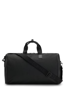 Zipped holdall in textured fabric with embossed logo, Black