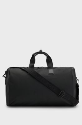 Zipped holdall in textured fabric with embossed logo, Black