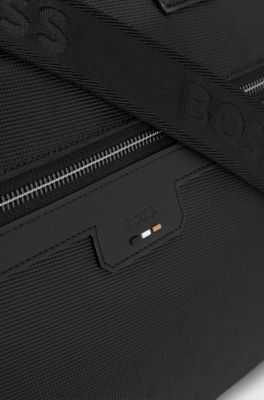 Zipped holdall in textured fabric with embossed logo, Black