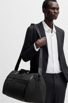 Zipped holdall in textured fabric with embossed logo, Black