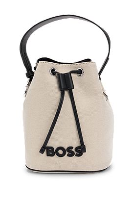 Textured bucket bag with faux-leather pouch