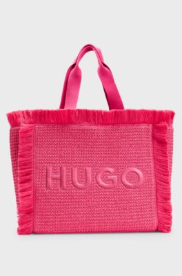Logo-embroidered raffia-effect tote bag with fringe trims, Pink