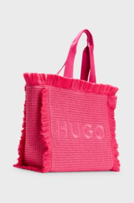 Logo-embroidered raffia-effect tote bag with fringe trims, Pink