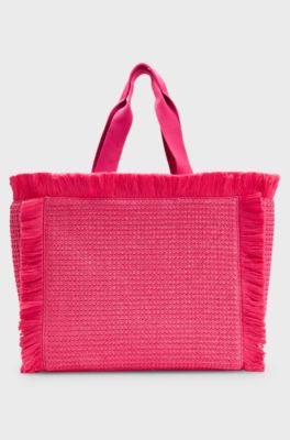 Logo-embroidered raffia-effect tote bag with fringe trims, Pink