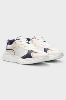 Mesh-detail trainers with rear pull loop, White / Dark Blue