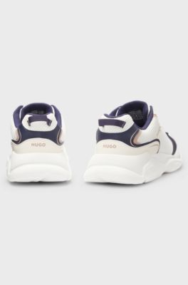 Mesh-detail trainers with rear pull loop, White / Dark Blue