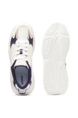 Mesh-detail trainers with rear pull loop, White / Dark Blue