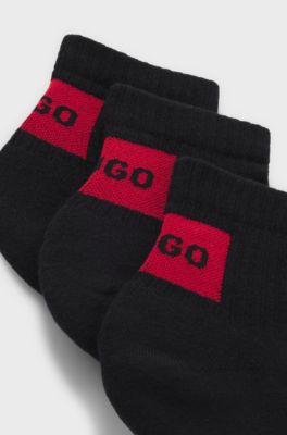 Dreierpack Sneakers-Socken mit rotem Logo-Label, Schwarz