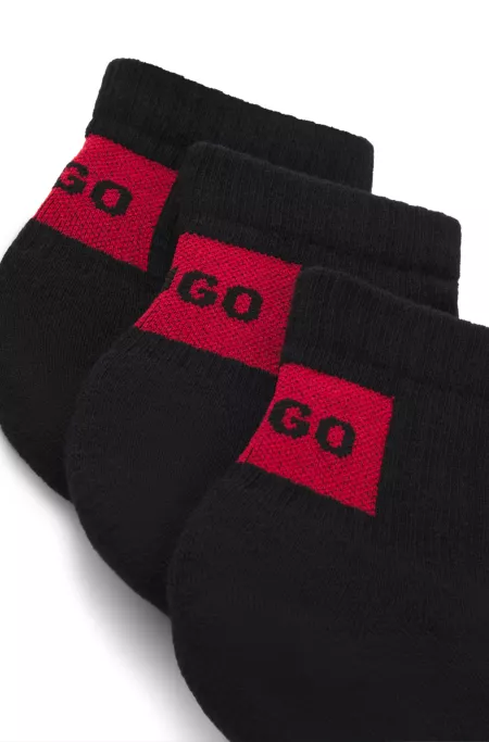Three-pack of ankle socks with red logo labels