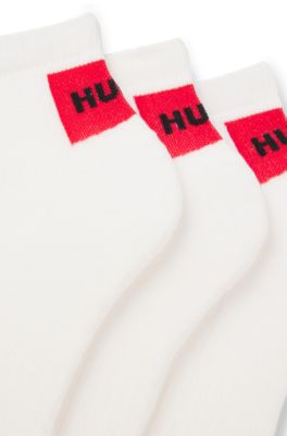 Three-pack of ankle socks with red logo labels, White