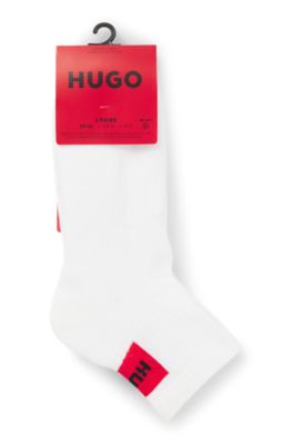 Three-pack of ankle socks with red logo labels, White