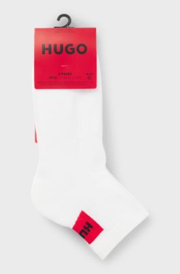Three-pack of ankle socks with red logo labels, White