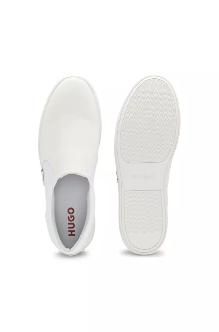 Slip-on shoes with logo vamp