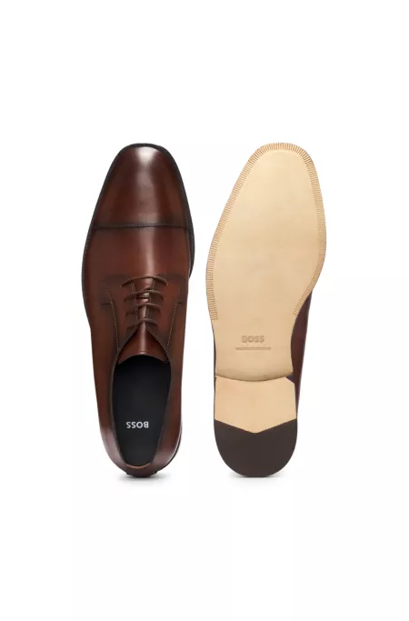 Cap-toe Derby shoes in leather