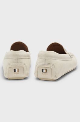 Suede moccasins with penny trim, White