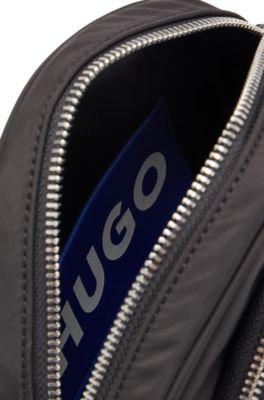 Circular crossbody bag with Happy HUGO logo, Black