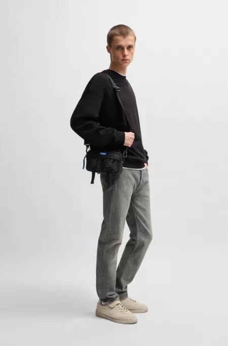 Reporter bag with blue logo label