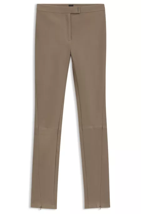 Legging en cuir avec fermeture à agrafe logotée