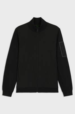 Thermoregulating hybrid jacket with zipped sleeve pocket, Black