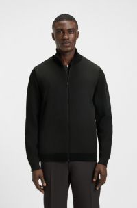 Thermoregulating hybrid jacket with zipped sleeve pocket, Zwart