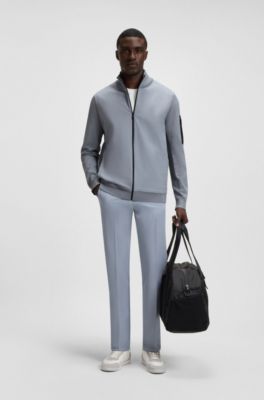 Thermoregulating hybrid jacket with zipped sleeve pocket, Grey